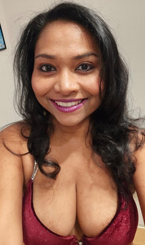 smiling face Bengali girl showing her big juicy